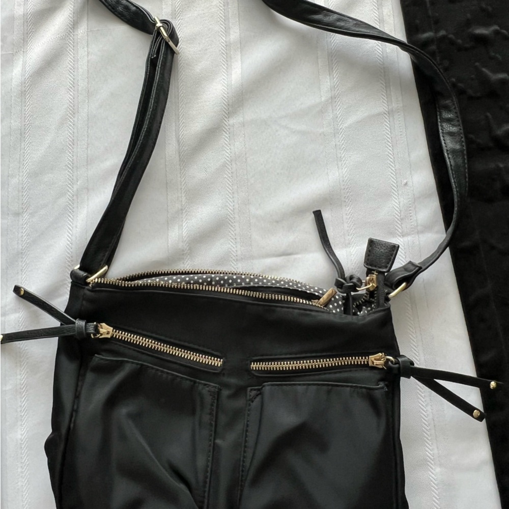 Chic Black Handbag with Gold Accents